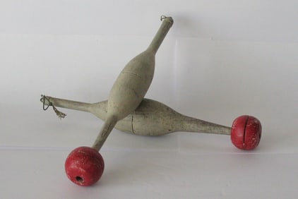 Pair of antique folk art fishing bobbers.