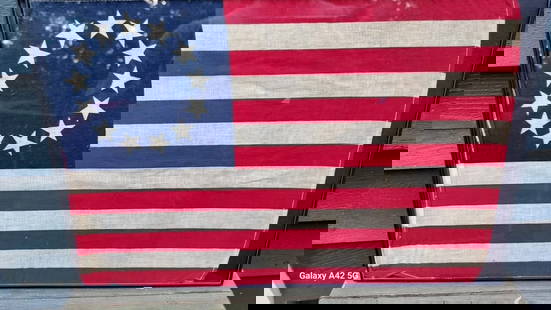 13 Star American Flag - parade flag 11 x 17" Betsy Ross 1926: Flag dates to 1926. Nice tight pattern. Sewn edges. Cotton material. Approximately 11x 17". Shipping includes insurance. Shipping: Domestic: Flat-rate of $17.00 to anywhere within the contiguous U.S.