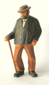 Antique folk art wood carving of a man.