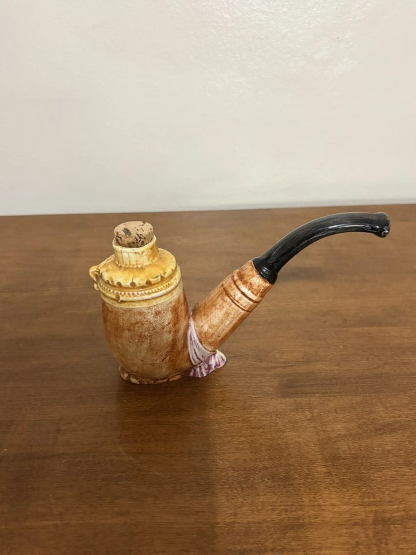 Rare Majolica Pipe Flask Bottle: It measures 7 1/4” x 2 1/4” x 4 1/4” and is marked. It has no chips, cracks or repairs. It is a very uncommon form in majolica flasks Shipping: Domestic: Flat-rate of $10.00 to anywh