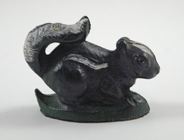Antique Skunk Cast Iron Bottle Opener