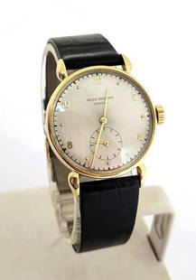 Vintage 18k PATEK PHILIPPE Mens Calatrava Winding Watch c.1950s Ref 590* RARE: Vintage 18k PATEK PHILIPPE Mens Calatrava Winding Watch Ref 590* RARE This Men's Patek Philippe watch is Swiss made Great present for watch collectors & enthusiasts! Very Rare collectors watch! * Soli