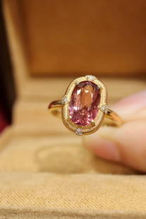 18k gold pink tourmaline ring: 18k gold powder tourmaline ring. Selected 1.18ct Afghan tourmaline. Gold weight 2.024g. Diamond 0.064ct. Bright crystal. Ring size is US size 7. Please contact us if you need to change it. Reserve: $2