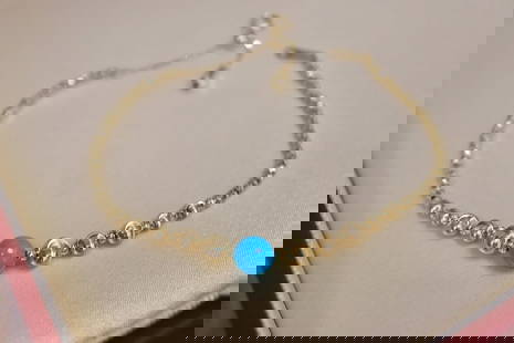 18K Gold Cat's Eye Turquoise Bracelet: 18K gold cat's eye turquoise bracelet. Total length 15+3cm. Pine beads about 6.5mm Reserve: $700.00 Shipping: Domestic: Shipping rates are determined by destination International: Foreign shipping rat
