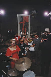 Party At The Playboy Mansion ' By Slim Aarons Oversized C Type: Description ' Party At The Playboy Mansion ' by Slim Aarons Guests of American publisher Hugh Hefner enjoying themselves at a party being held at the Playboy Mansion, Chicago, 1961. (Photo by Slim Aar