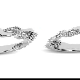 10 KT White Gold 1/20 CTTW Diamond Twisted Wedding Band: Title: 10 KT White Gold 1/20 CTTW Diamond Twisted Wedding Band Description: This dazzling stackable Wedding Ring crafted in precious 10 KT white gold, this shimmering design features alternating twist