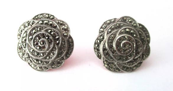 Pair of Sterling Silver Art-Deco Screw-Back Earrings With Marcasite Stones: Pair of Deco Sterling Silver Flower Screw-Back Earrings Circa. 1930-1935 American Sterling screw back earrings set with marcasite stones. These are flowers, which were a typical subject style for the