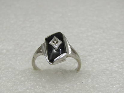 Vintage 10kt Black Onyx Diamond Ring, Sz. 6.5, Art Deco Themed: Vintage 10kt Black Onyx Diamond Ring, Sz. 6.5. Signed BT and marked 10 for 10kt and tested weight of the ring is appx. 2.41 gr. The ring is an angled stone set slightly on the diagonal and is appx. 15