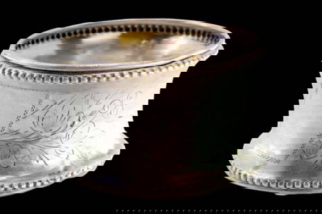 Silver napkin ring with engravings involving a coat of arms for monogram and pearly borders on the: Description: Silver napkin ring with engraving involving a coat of arms for monogram and pearly friezes on the surroundings. Metal: Silver. Origin: Portuguese. Brand: Javali II Title. Weight: 10.14 gr