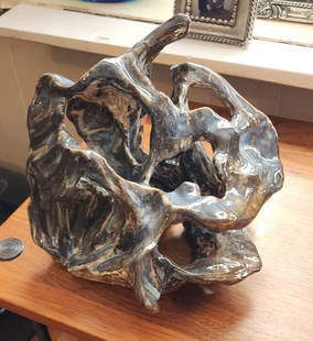 Incredible mid-century vintage brutalist organic ceramic abstract sculpture: Incredible mid-century vintage brutalist organic ceramic abstract sculpture with wonderful glaze. Piece has more Deep Blue in the color that is reflected in the photos. A great look. Shipping: Domesti