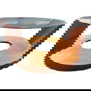Modernist Mahogany and Glass Coffee or Cocktail Table by Gilbert Rohde: About the Item A sleek Modernist mahogany and glass coffee or cocktail table by Gilbert Rohde showcasing his signature streamlined aesthetic. The rich mahogany frame features clean lines and elegant c