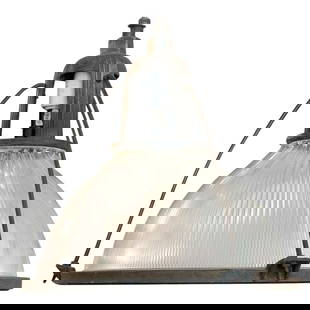 Holophane Industrial Hanging Pendant Light: About the Item This industrial yet elegant hanging light from the 1940s features a Holophane glass shade. The pendant is connected by an aluminum casing fixed to the top of the light fixture. A Holoph