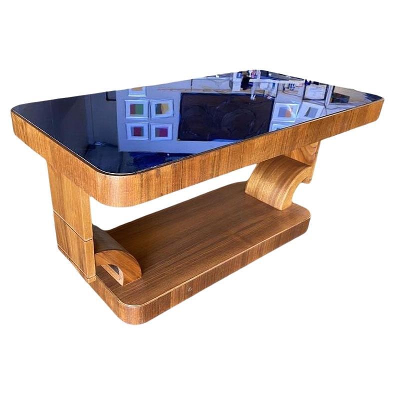 Gilbert Rohde Style Art Deco Mahogany Coffee Table w/ Cobalt Glass Top: About the Item Gilbert Rohde Style Streamline Art Deco mahogany coffee table with cobalt glass top and a Modernist hourglass base. The tabletop, made from vibrant cobalt blue glass creates a striking