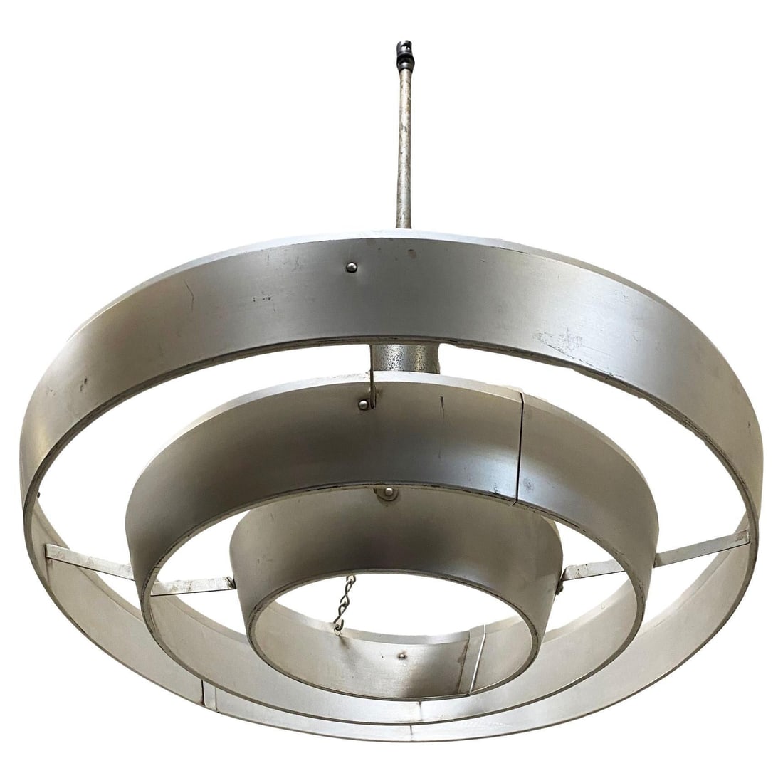 Mid-Century "Saturn" Ceiling Aluminum 19" Pendant by Kurt Versen - QTY 17: About the Item Quantity 17 Available Kurt Versen designed the "Saturn" ceiling light featuring a stacked aluminum ring light shade suspended by wire to a focused light socket. Altogether this light fi
