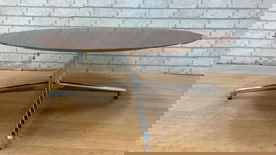Mid Century Modern Herman Miller Style Round Wood Coffee Table with Chrome Legs: Vintage from before 2000 Materials: Wood, Metal, laminate Width: 35 inches Height: 14 inches Depth: 35 inches Shipping is NOT $1, please read below how to get a shipping quote. Mid Century Modern Herm