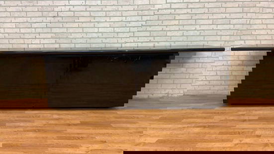 Mid Century Modern Acerbis International Black High Gloss Media Cabinet/Credenza: Vintage from the 1970s Materials: wood, stainless steel, metal Width: 110 inches Height: 28 inches Depth: 19.5 inches Mid Century Modern Acerbis International Black High Gloss Media Cabinet/Credenza T