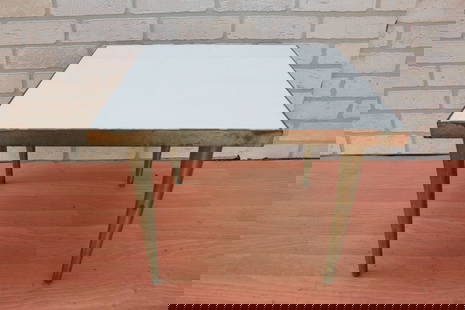 Vintage Modern Low Square Side Table: Vintage from the 1960s Materials: plastic, wood, metal Width: 18 inches Height: 14 inches Depth: 18 inches Vintage Modern Low Square Side Table The table has metal legs that have been painted gold, wo