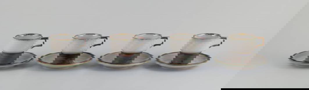 Bing & Grøndahl, Tema. Four sets of coffee cups and saucers in stoneware. 1970s.: Bing & Grøndahl, Tema. Four sets of coffee cups in stoneware. From the 1970s. Model: 305. Marked. In perfect condition. First factory quality. Cup: Diameter 7.5 cm without handle x Height 7.2 cm.