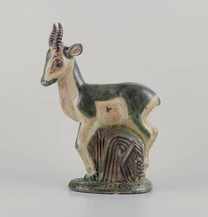Axel Salto, Royal Copenhagen. Large and impressive ceramic sculpture of a deer. Approx. 1940: Axel Salto (1889-1961) for Royal Copenhagen. Large and impressive ceramic sculpture of a deer. Art Deco style. Model number 20697. Approximately from 1940. Marked. Perfect condition. First factory qua
