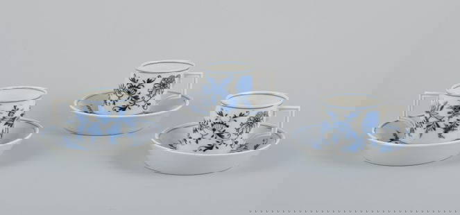 Meissen, Germany. Blue Onion. A set of three small chocolate cups with saucers. Hand-decorated with: Meissen, Germany. Blue Onion. A set of three small chocolate cups with saucers. Hand-decorated with blue flowers. Approximately from the 1920s. Signed. Perfect condition. First factory quality. Cup: H