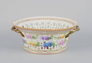 Royal Copenhagen Flora Danica porcelain fruit bowl, decorated in colors and gold with flowers.