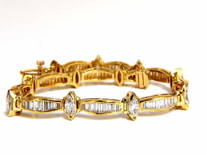 6.00ct baguettes marquise diamond tennis bracelet 18kt g/vs +: Contemporary Tonneau Alternating Tennis 6.00ct. Natural diamonds bracelet. Baguettes & Marquise, full cuts 2.25ct marquise & 3.75ct diamonds. G color Vs-2 clarity. 99 baguettes / 11 marquise 7.8mm wid
