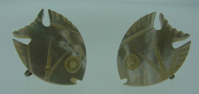 CHIC Sterling Silver & Mother of Pearl Pisces Clip On Earrings Circa 1950s: DK Silver & Mother of Pearl Pisces Clip On Earrings Circa 1950s &#183; Wonderful earrings that is a necessity in your collection. &#183; The weight is 10.4 grams. &#183; The length is 1 3/16 of an inc