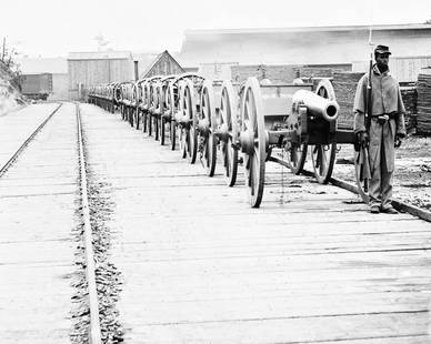 1857, AFRICAN AMERICAN SOLDIER GUARDING NAPOLEAN CANONS: Title: 1857, AFRICAN AMERICAN SOLDIER GUARDING NAPOLEAN CANONS Artist/Source: UNKNOWN Original Date: 1857 Dimensions: 8 x 10 Description: || UNITED STATES SHIPPING ONLY! || This lot is a Dye Based Pho