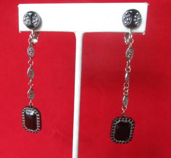 Pair of Art-Deco Black Glass &Silver Screw Back Earrings: Pair of Vintage Deco Black Glass & Silver Earrings Circa. 1930 American New old stock Never worn Pair of black glass with silver accents (looks like cut steel) dangle earrings. 2 3/4 inches long 3/8 i