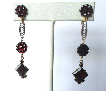 Pair of Vintage Dark Red Burgundy Crystal & Brass Screw-Back Earrings: Pair of Vintage Dark Burgundy Red Faceted Crystal & Brass Screw-Back Earrings Circa. 1935 Czechoslovakia Rare and wonderful pair of dark burgundy crystal earrings. These are old-new stock. Vintage ear