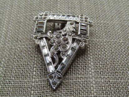 Vintage Rhinestone Dress Clip, 1930's, Pointed, Baguettes: Vintage Rhinestone Dress Clip, 1930's, Pointed, Baguettes. This has a rectangular top with round stones set in the upper corners and baguettes framing with a pointed drop with a raised scrolled design