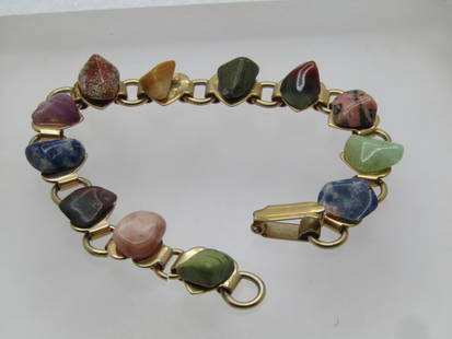 Vintage Mixed Agate & Jasper Nuggets Bracelet, 7", 1960's: Vintage Mixed Agate Nuggets Bracelet, 7", 1960's. Natural stones. Gold tone with a flip clasp. It has flat heart bases that the stones are glued too. The stones are a mix of colored agates: 