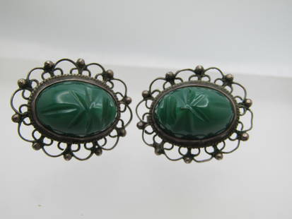 Vintage Sterling Carved Mask Earrings, Mexico, Screwback, Green Chalcedony, 1950's-1960's: Vintage Sterling Carved Mask Earrings, Mexico, Screwback, Green Chalcedony, 1950's-1960's. They are oval shaped with a filigree frame and bezel-set green chalcedony mask that is appx. 15.5mm by 11mm.
