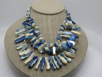 Vintage Blue & White MOP Triple Strand Necklace, Japan, 1940's-1950's: Vintage Blue & White MOP Triple Strand Necklace, Japan, 1940's-1950's, the necklace is appx. 16" long with a hook clasp where it is signed Japan. Blue and white mother of pearl nuggets drop down in tw