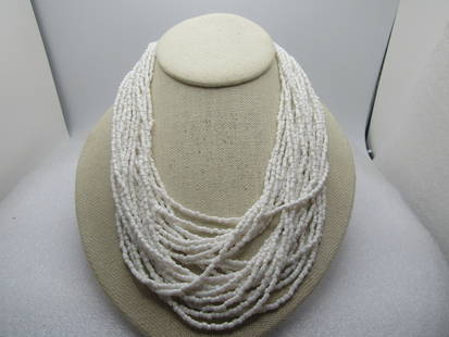 Vintage 24 Strand White Seed Bead Necklace, 1940's-1950's, 25": Vintage 24 Strand White Seed Bead Necklace, 1940's-1950's, 25". White glass seed beads that are not all exactly the same size/shape - these are more tubular and width is slightly different. They have
