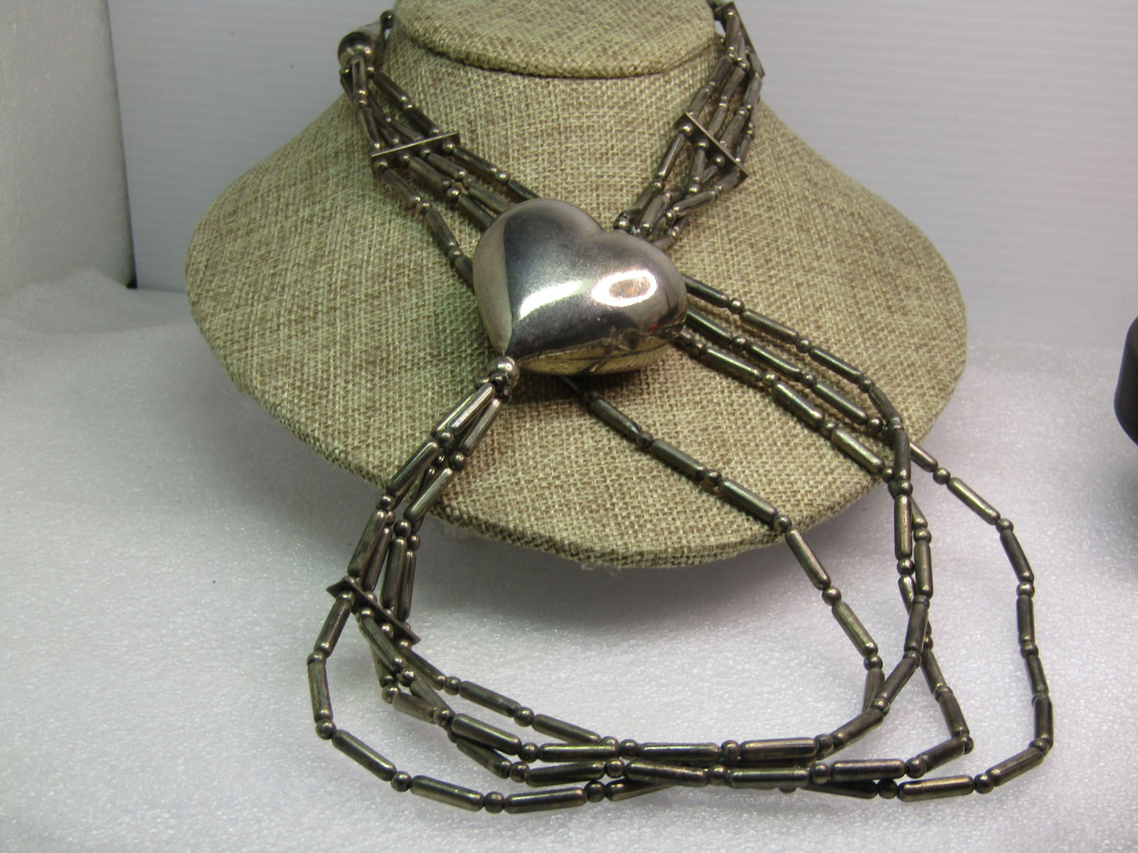 Vintage Southwester Chunky Heart Necklace, Triple Strand - Repurpose, 1970-1980's: Vintage Southwester Chunky Heart Necklace, Triple Strand - Repurpose, 1970-1980's. It is intact in the photo but while doing the listing, the one strand did break. I beleive all the beads were recover
