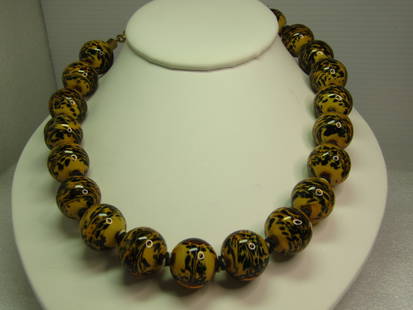 Vintage Yellow & Black Glass Beaded Necklace, Chunky, 18mm, 1980's: Vintage Yellow & Black Glass Beaded Necklace, Chunky, 18mm, 1980's with large 3/4" spring ring clasp, gold tone extender chain and maker's mark charm at the end that has a very unique design that I co