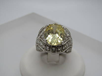 Silver Plated Yellow/Clear CZ Ring, Statement, Sz. 6: Silver Plated Yellow/Clear CZ Ring, Statement, Sz. 6. This has an art deco themed but it is a current ring. It is marked. .925 but tests as plated. It is signed CWE, marked with CZ and also Thailand.