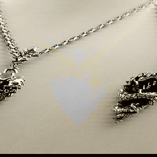 925 Silver Chain with Cobra Skull Pendant: Title: 925 Silver Chain with Cobra Skull Pendant Description: 925 Silver Chain with Cobra Skull Pendant -Total Weight:31.5g Chain Size: 23.62 in(60cm). Pendant Size:1.06x1.41 in (27x36mm) (Bail includ