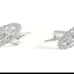 Flower Cluster Split Shank Halo Diamond Engagement Ring 18K White Gold .90 CTW: Flower Cluster Split Shank Halo Diamond Engagement Ring 18K White Gold .90 CTW This lovely diamond engagement ring is sure to make her smile! Don't hesitate to ask any questions! Diamonds: 73 round br