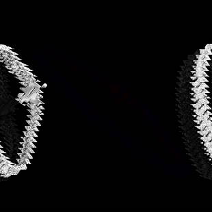 5.35 TCW IGI Certified Lab Grown Diamonds 14K WG Designer Tennis Bracelet: Title: 5.35 TCW IGI Certified Lab Grown Diamonds 14K WG Designer Tennis Bracelet Gemstone: Diamond Color: E Shape: Round Size: 3 mm Quantity: 52 Ctw: 5.35 Grade: VVS -VS Primary: 14k Solid Gold Color: