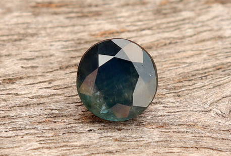 Natural blue Teal Sapphire 1.11 carat: Title:Natural blue Teal Sapphire 1.11 carat Additional Info:Gemstone: Natural SapphireCarat Weight: 1.11Shape/Cut: Round CutMeasurements: 5.81-5.77x4.13 mmColor: BlueTransparency: TransparentClarity :