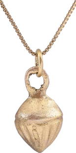 ANCIENT ROMAN SHELL PENDANT NECKLACE C.100-350 AD.: Gilt bronze, about 5/8" in height plus the ring. Large domed form medially banded and fluted below. The back is hollow. A form about which there is some uncertainty. Romans were very dependent on the