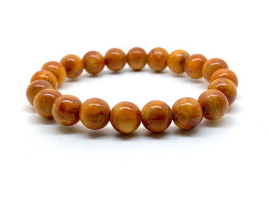 Phenomenal Amber Bracelet made from Round Amber beads: Title: Phenomenal Amber Bracelet made from Round Amber beads Metal:None Gemstone: Amber Weight :13.0 g Size:Bead size: 13.0 mm Bead size: 0.512 inches Made of: (Reconstituted Amber or Whole Stone):Rec