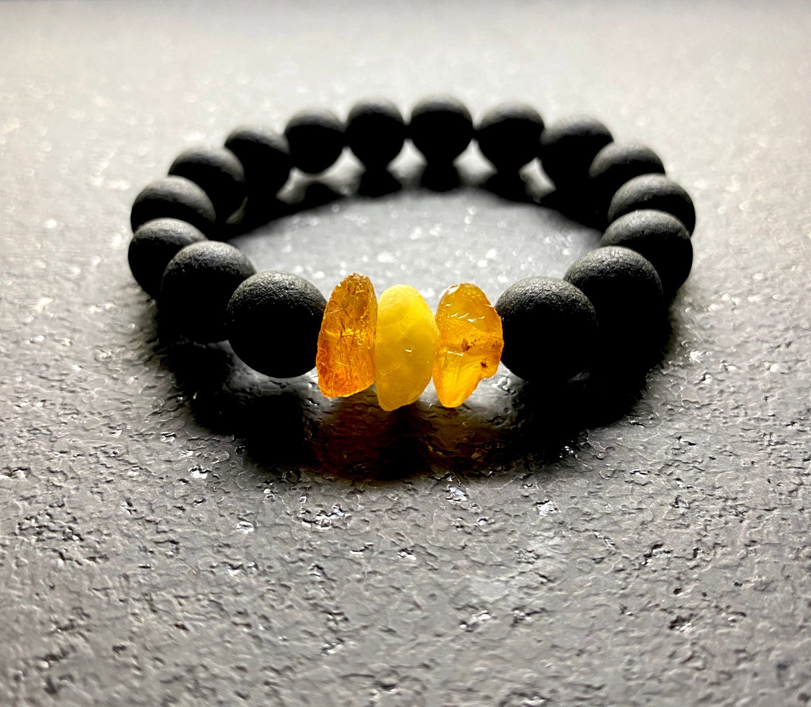 Outstanding Amber Bracelet made from Round Amber beads: Title: Outstanding Amber Bracelet made from Round Amber beads Metal:None Gemstone: Amber Weight :13.9 g Size:Bead size: 11.0 mm Bead size: 0.433 inches Made of: (Reconstituted Amber or Whole Stone):Re