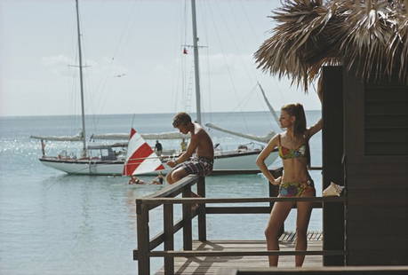 Fishing On Honeymoon Porch ' By Slim Aarons Oversized C Type: Description ' Fishing On Honeymoon Porch ' by Slim Aarons A couple relax on a porch in Exuma, Bahamas, 1967. (Photo by Slim Aarons/Hulton Archive/Getty Images) Paper size 16 x 20 inches / 41 x 51 cm u