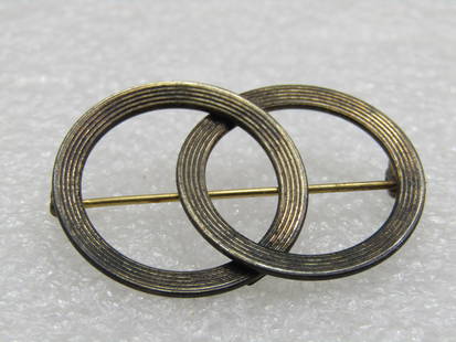 Vintage Beau Sterling Double Circle Brooch, 1940's, 1.5": Vintage Beau Sterling Double Circle Brooch, 1940's, 1.5" wide and 1" tall. Marked Beau Sterling and tested. Weight is papx. 4.59 gr. Interlocked circle brooches. Very good condition other than oxidati