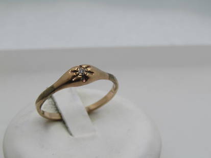Antique 10kt Edwardian Diamond Engagement Ring, Sz. 9, 1900-1914: Antique 10kt Edwardian Diamond Engagement Ring, Sz. 9, 1900-1914. The 1.5mm diamond is set into a blossom cut-out design on top with six open petal-like designs. Weight of the diamond is appx .1 ctw.
