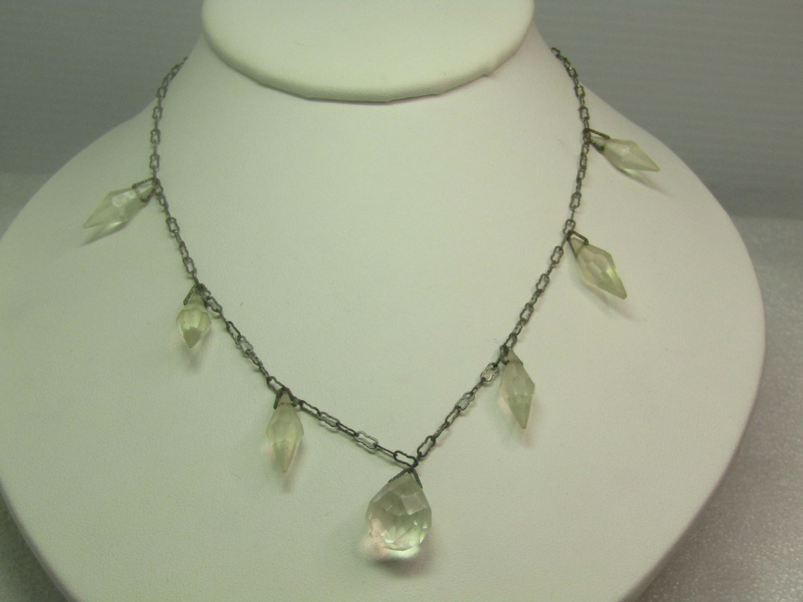 Antique Crystal Faceted Drop Necklace, Repair/Repurpose, 17": Antique Crystal Faceted Drop Necklace, Repair/Repurpose, 17". This has seven faceted drops - sixe are pointed and appx.3/4" each and the center is a faceted teardop that is also appx. 3/4" long but is