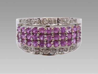 Pink Sapphire & Diamond 18ct White Gold Band Ring: Pink Sapphire & Diamond 18ct White Gold Band Ring Vintage, 20th c. Pink sapphire & diamonds, 18ct white gold Weight 5.26 g Ring size R (British), 8.75 (US) Sapphire & diamond set graduating band ring,